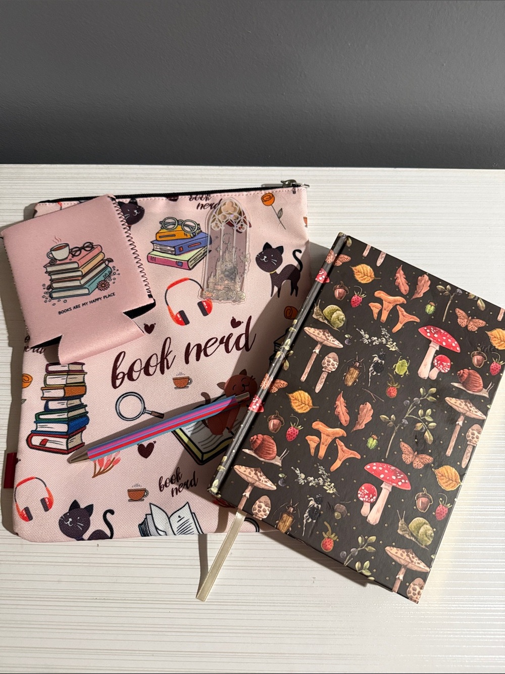 Book nerd bundle. Books leave, journal, pen, bookmark, and Cousy.